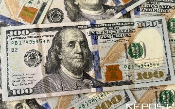 Спустя день курс доллара упал ниже 11 400 сумов