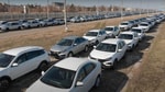 Сотни некомплектованных белых LADA Vesta NG желтеют на парковке в ожидании деталей