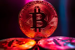 Стоимость биткоина может упасть до $77 тысяч