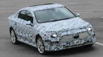 Обновленный электрический седан Mercedes-Benz EQA в камуфляже заметили в пробке