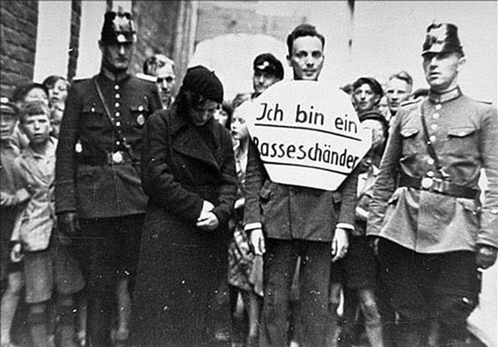 Yahudiy ayolni sevib qolgan nemis yigit. U irqni buzuvchilikda ayblangan. Germaniya, 1935-yil