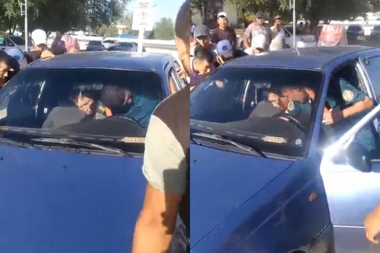 В Кашкадарье инспектор ДПС применил силу к водителю, чтобы вытащить его из авто — видео