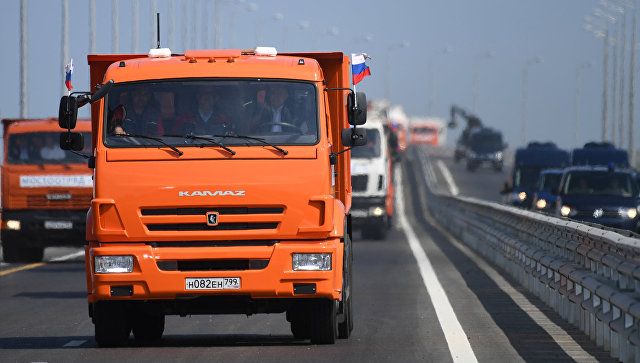 Путин проехал за рулем КамАЗа и открыл Крымский мост (видео) 