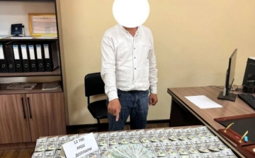 Житель Ташобласти пытался продать фальшивые $10 тысяч за настоящие деньги