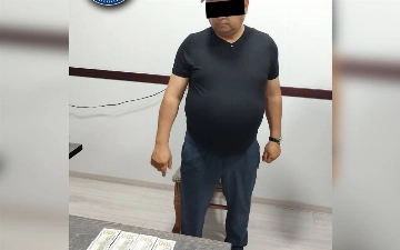 Buxoroda MCHJ rahbarining mol-mulkiga qo‘yilgan taqiqni bekor qilish evaziga 400 dollar olgan soliq inspektori ushlandi