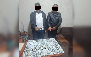 Andijonda 30 sotix yerni sotmoqchi bo‘lgan mahalla raisi va hokim yordamchisi ushlandi