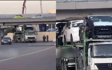 В Ташкенте автовоз с дорогими автомобилями застрял под мостом