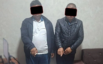В Андижане председателя махалли и помощника хокима задержали при получении более $30 тысяч