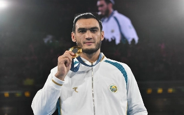 Олимпийского чемпиона по боксу Лазизбека Мулложонова дисквалифицировали на три года