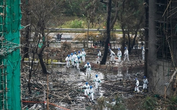 Число погибших при пожаре в Гонконге приблизилось к 160