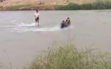 Под Ташкентом спасли двух подростков, застрявших посреди реки (видео)